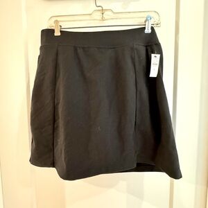 NWT T by Talbots Black Skort. Side pockets. Cotton blend. Size PL